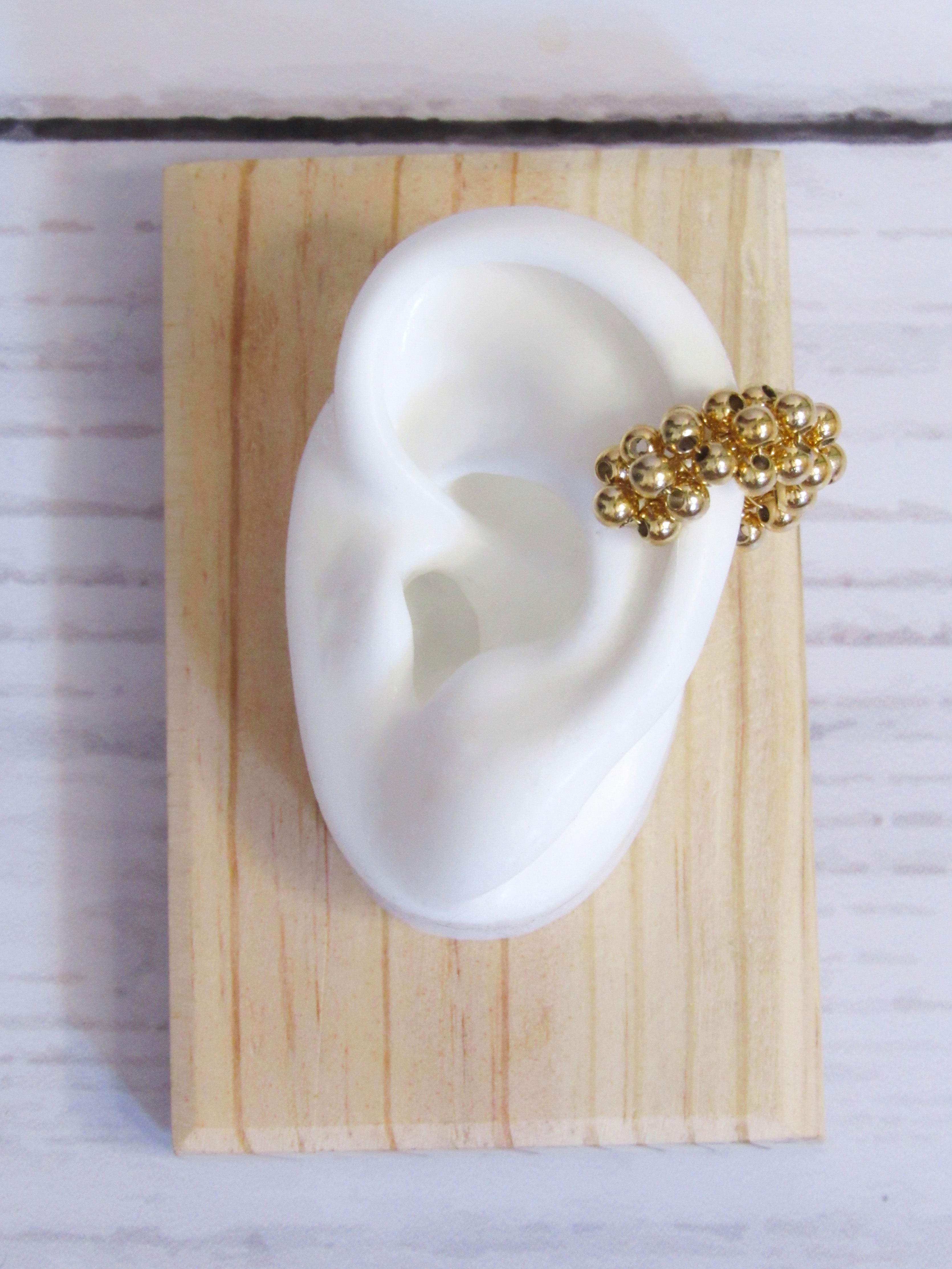 Earcuff tejido goldfied