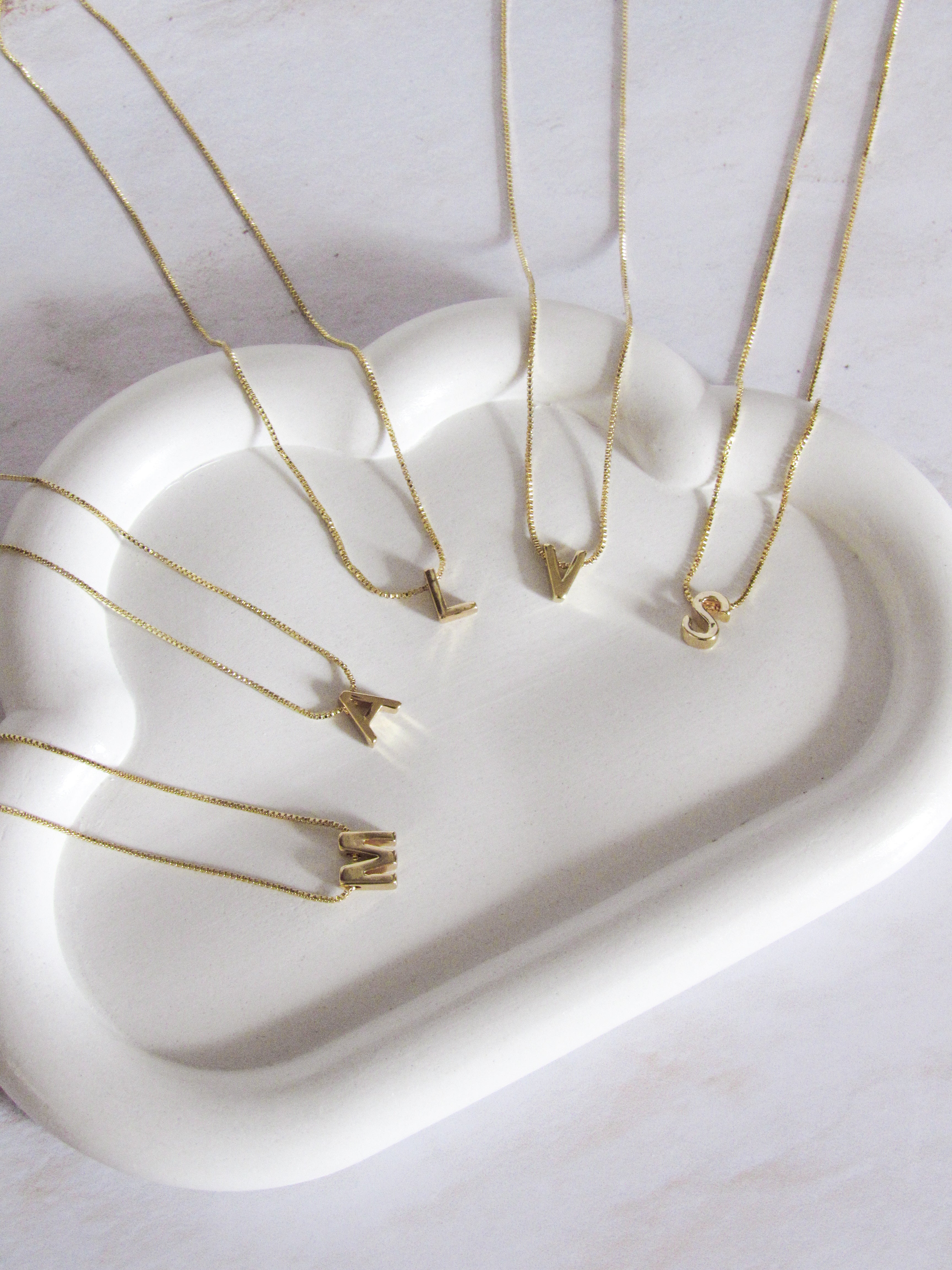 Collar inicial pasador