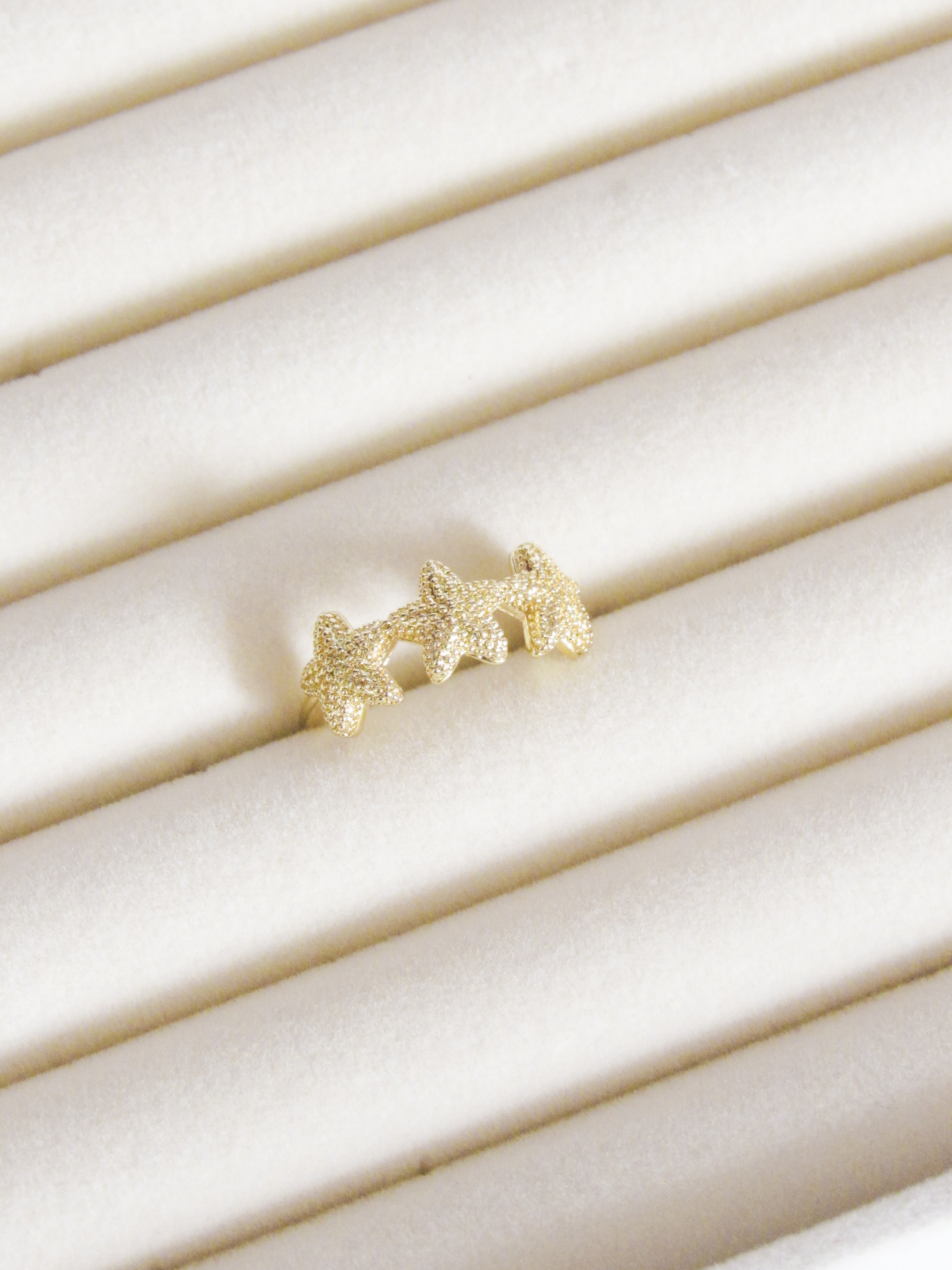 Anillo graduable estrellas de mar