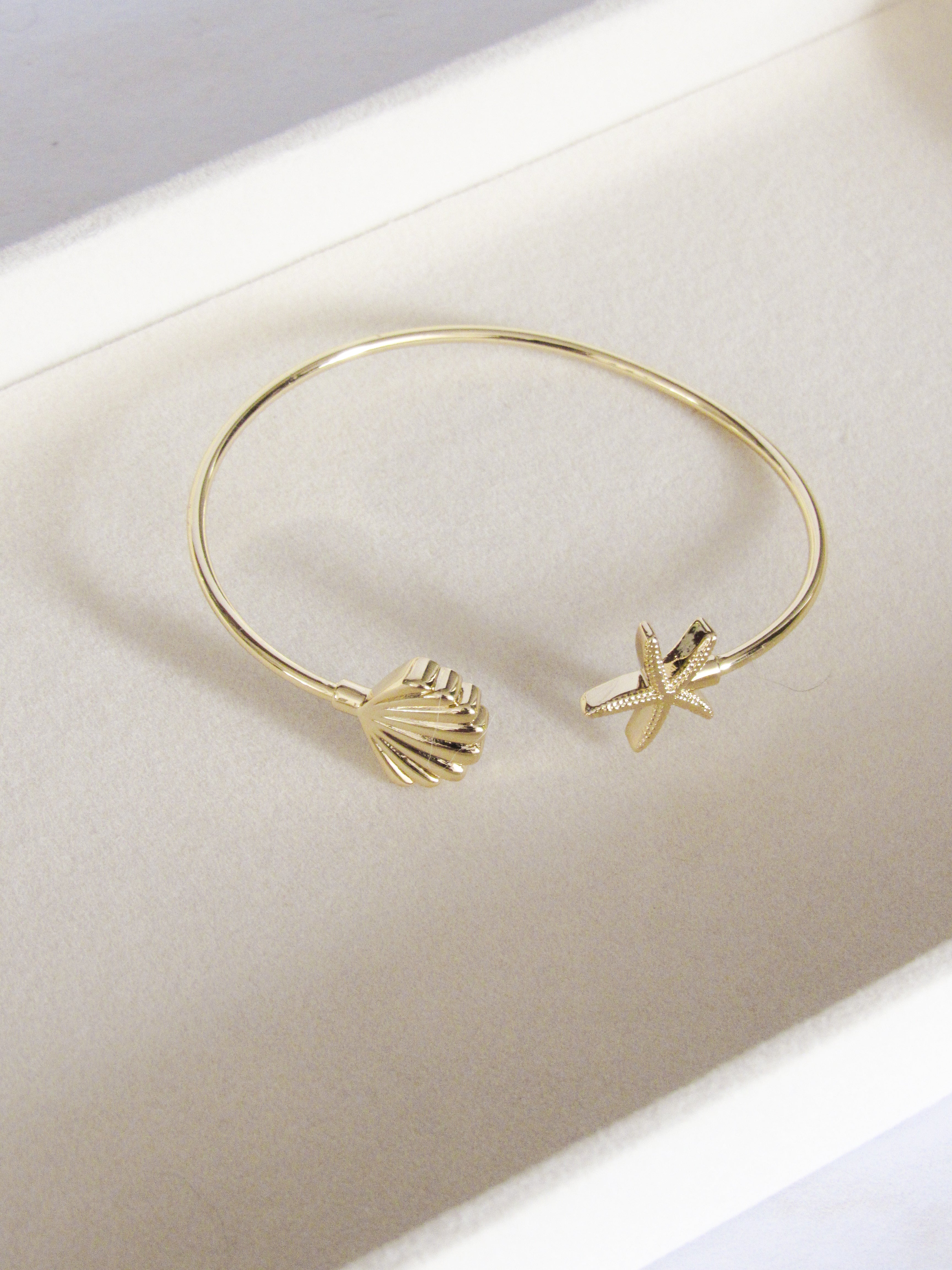 Brazalete estrella concha