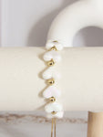 Pulsera corazones blanca